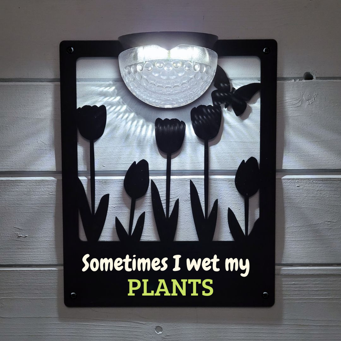 'Sometimes I wet my plants' Tulips Solar Light Wall Plaque