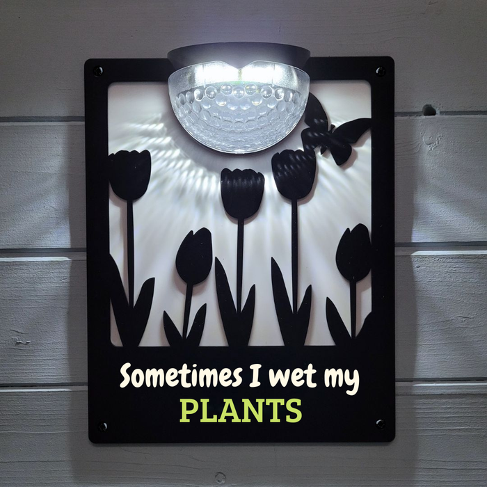 'Sometimes I wet my plants' Tulips Solar Light Wall Plaque
