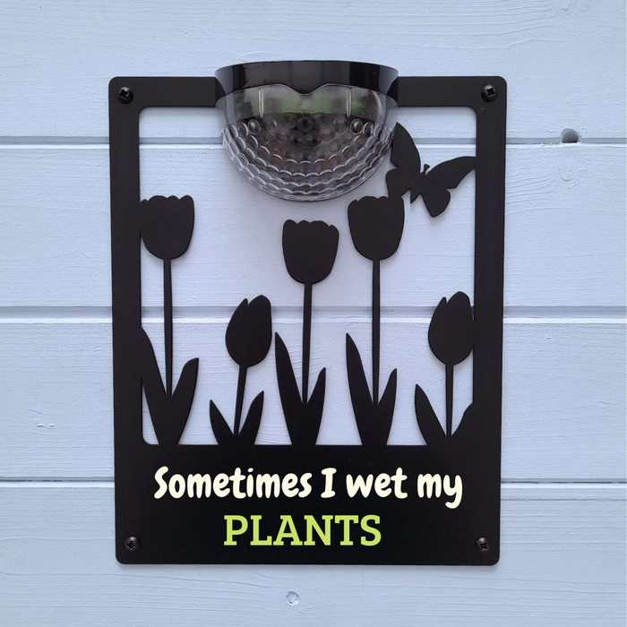 'Sometimes I wet my plants' Tulips Solar Light Wall Plaque